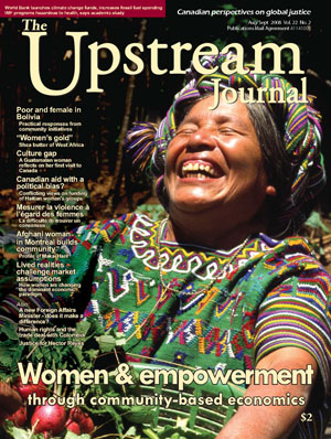An ecstatic woman in traditional mayan clothing laughing heartily, featured on the cover of 'the upstream journal' magazine, highlighting themes of women, community, and economics.