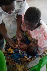 Photo: Immunizations and oral polio vaccinations being given to infants at Dowa District Hospital in Dowa, Malawi. Photo by Barbara Kinney, Gates Foundation