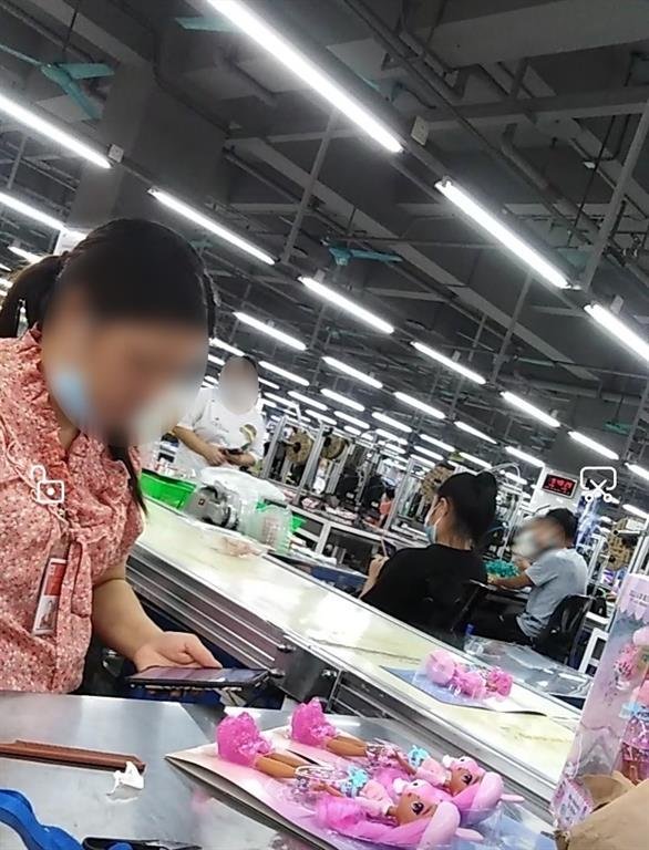 Worker in toy factory
