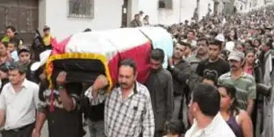 Funeral on crowded street