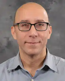 Dr. William Avilés smiling for a photo